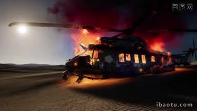 在夕阳时在<strong>沙漠里</strong>燃烧<strong>的</strong>军事直升机